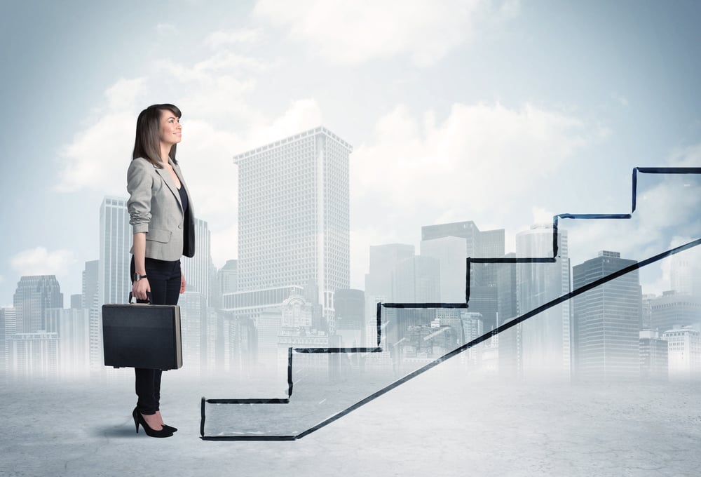 Business person in front of a staircase, city on the background-2