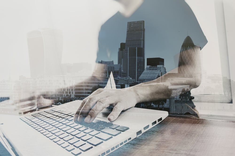 Double exposure of businessman working with new modern computer-3